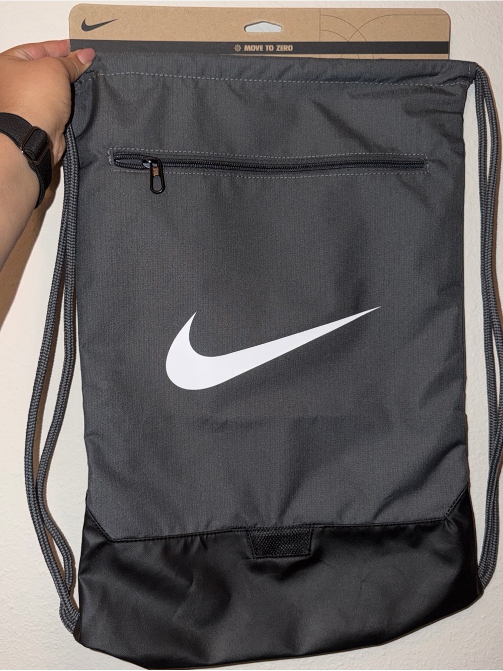 Nike Gray and White Drawstring Backpack with Front Zip Pocket